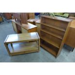 A teak open bookcase and a simulated rosewood metamorphic trolley