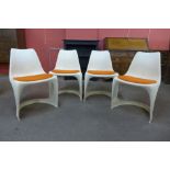 A set of four Danish Cado white perspex chairs, designed by Steen Ostergaard