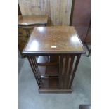 An Edward VII inlaid mahogany freestanding bookcase