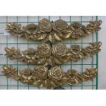 A set of three French gilt floral appliques