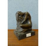 An Art Nouveau style bronze figure of a keeling female nude