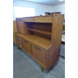 A Stonehill Stateroom teak highboard