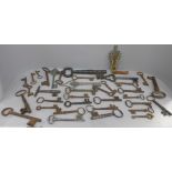 A large collection of antique and replica door and lift keys