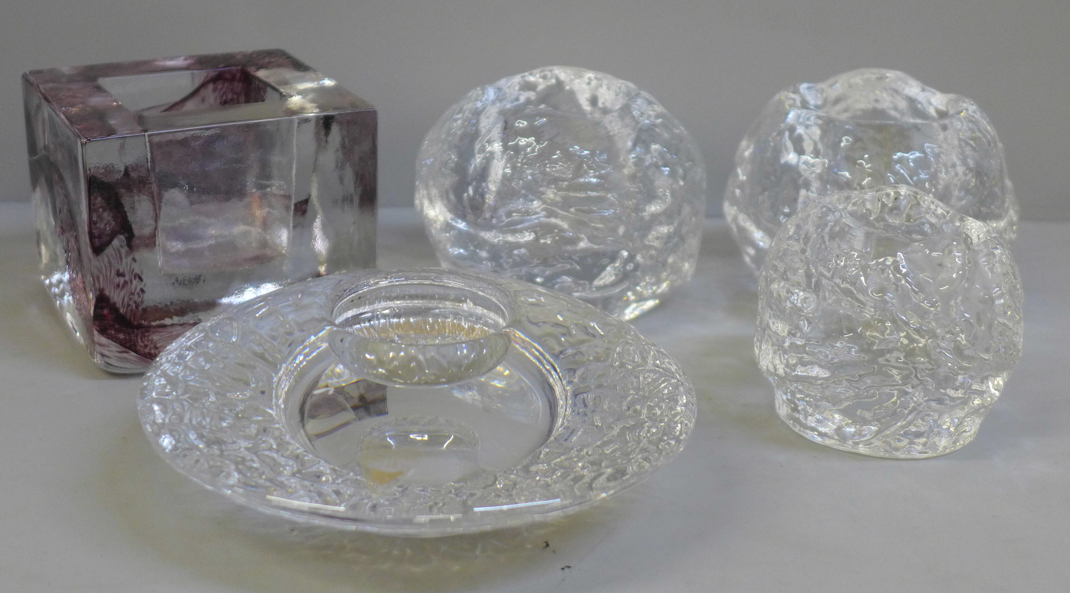 Five Swedish glass candle holders by Kosta Boda (4) and Orrefors (1)