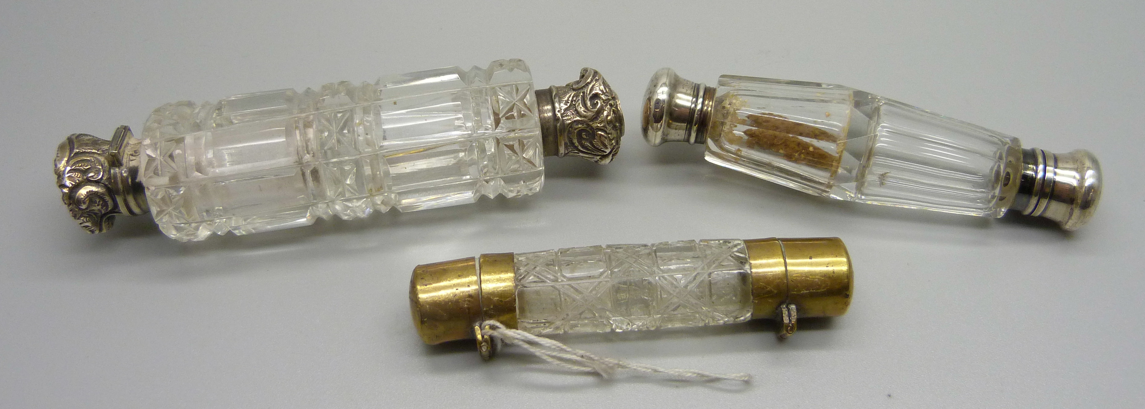 Three glass double scent bottles