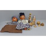 Two 1950's glove puppets, three Swedish wooden dolls, one other peg doll and two egg cups