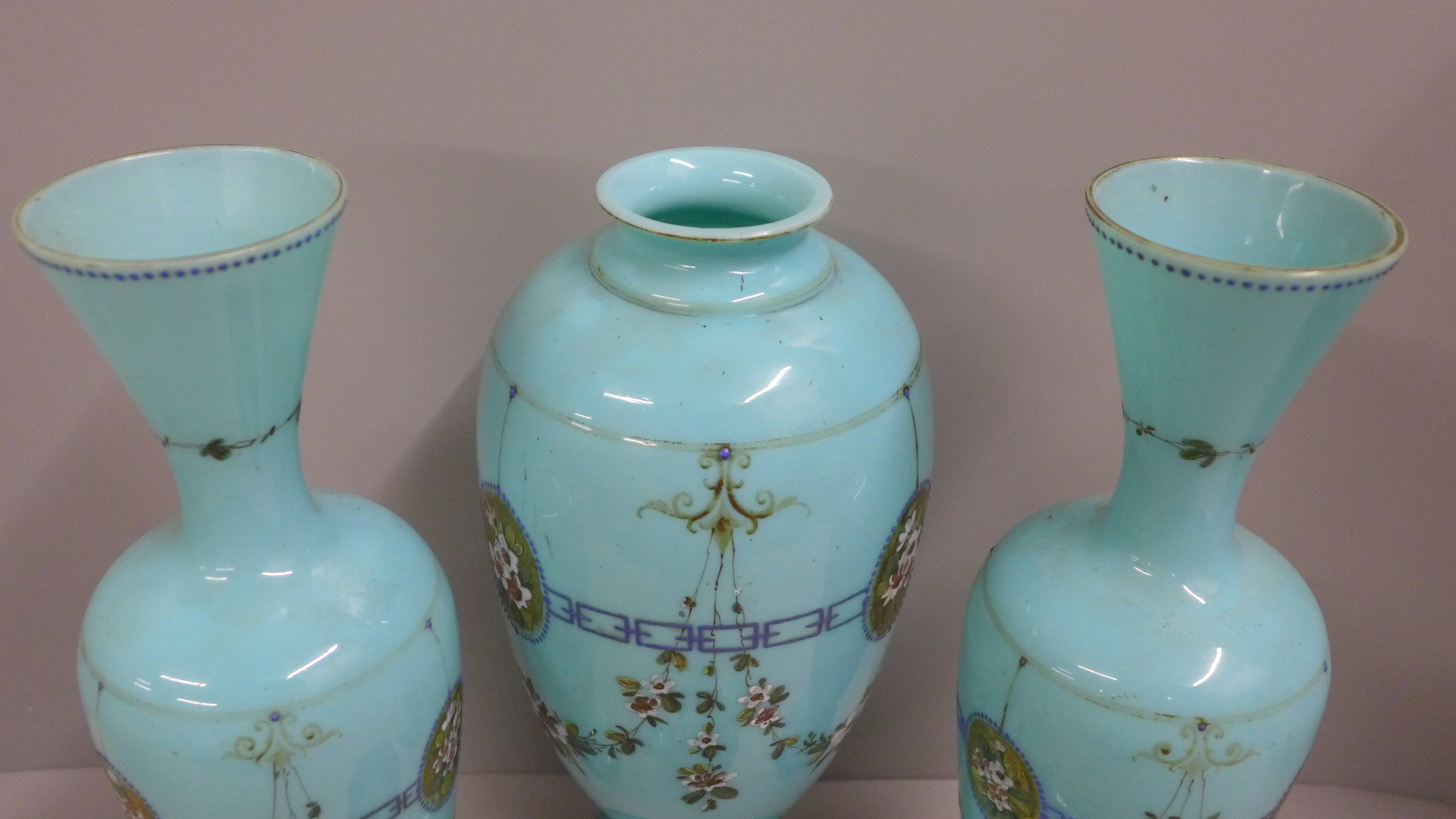 A pair of blue opaline glass vases and one taller lidded vase, enamel painted of swags of flowers - Image 4 of 6