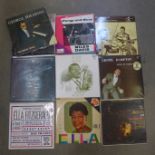 Fourteen jazz vinyl LP records including Miles Davis, Duke Ellington, Ella Fitzgerald, etc.
