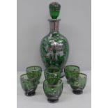 A liqueur set; silver overlay green glass decanter and six glasses