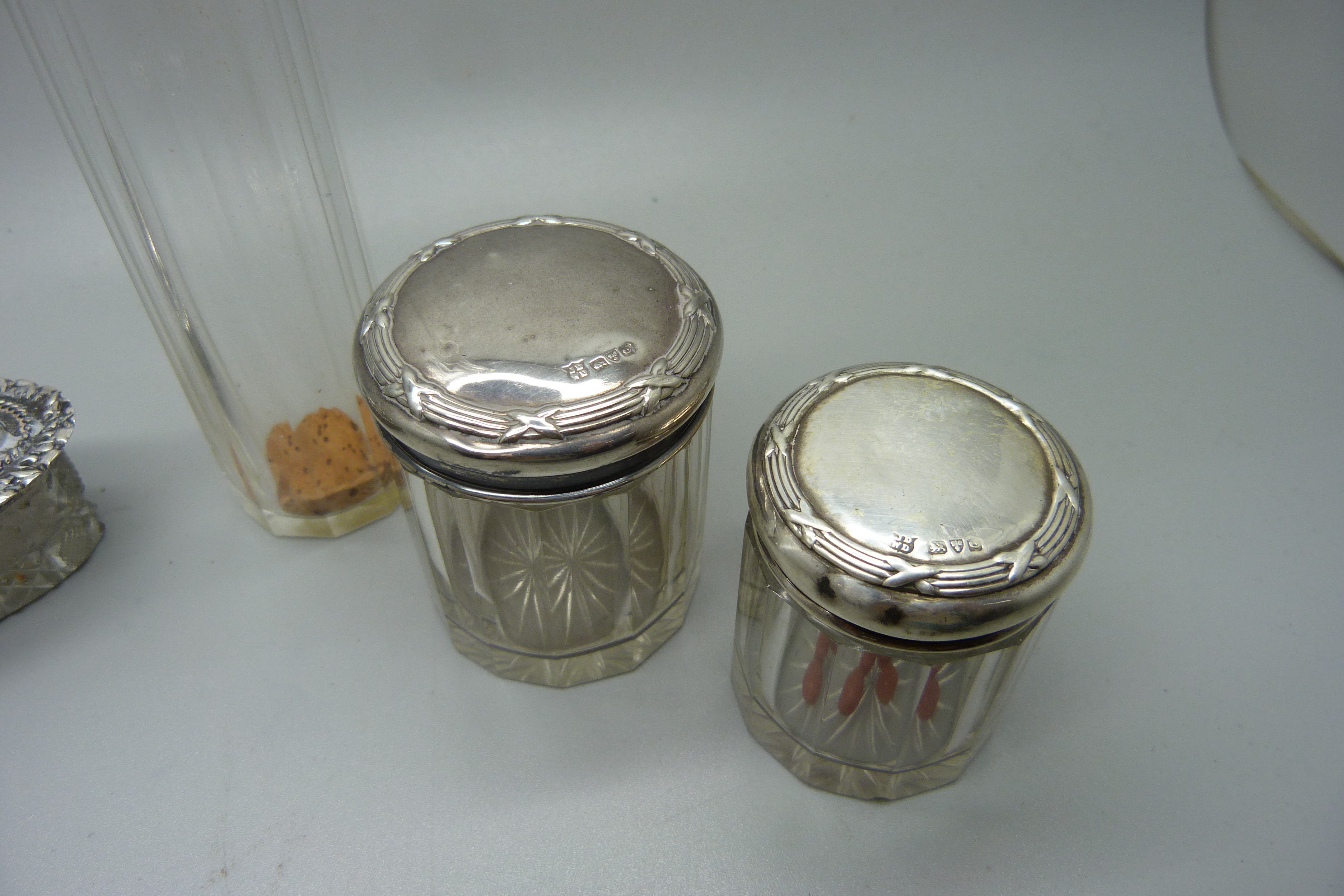 Three silver topped glass jars and a silver topped glass bottle - Image 4 of 4