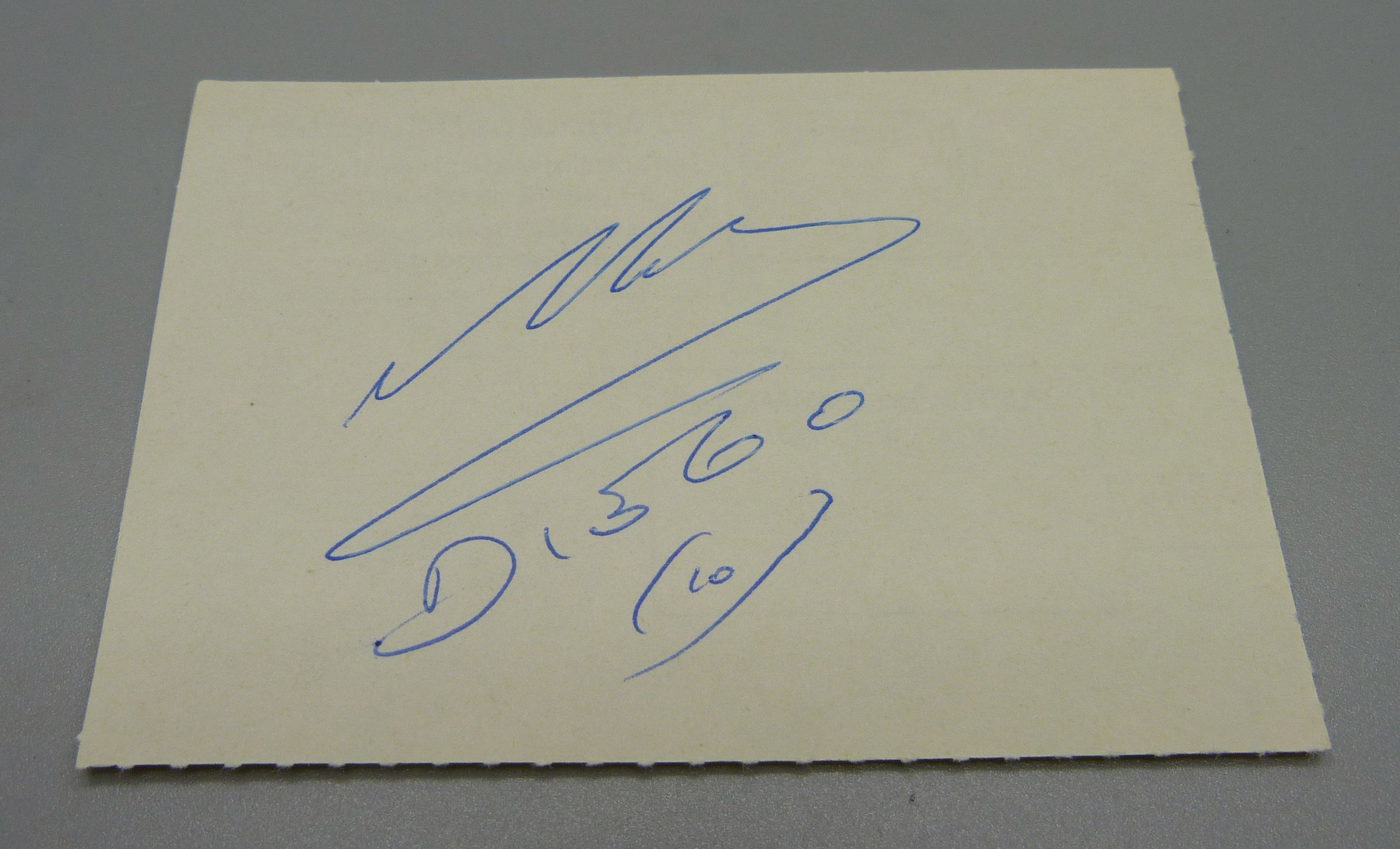 A Maradona autographed page, on a flight boarding pass