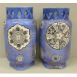 A pair of early 20th Century blue transfer printed vases, 20.5cm