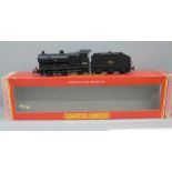 A Hornby OO gauge locomotive and tender, R2066 Class 4F 0-6-0 44331 in BR black, associated box