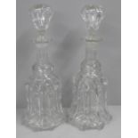 A pair of Victorian Newcastle bell shaped crystal decanters