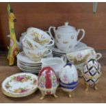 A Japanese tea set, three egg trinket pots, two Old Country Roses dishes and a model of a giraffe