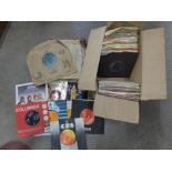 A collection of 7" 45rpm records including Elvis, Abba, Buddy Holly, classical, etc., and a