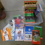 Sporting memorabilia; a large box of football annuals and programmes including England