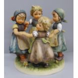 A Hummel figure group, Ring around the Rosie, dated 1957 to the base