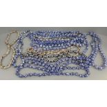 Fifteen porcelain bead necklaces