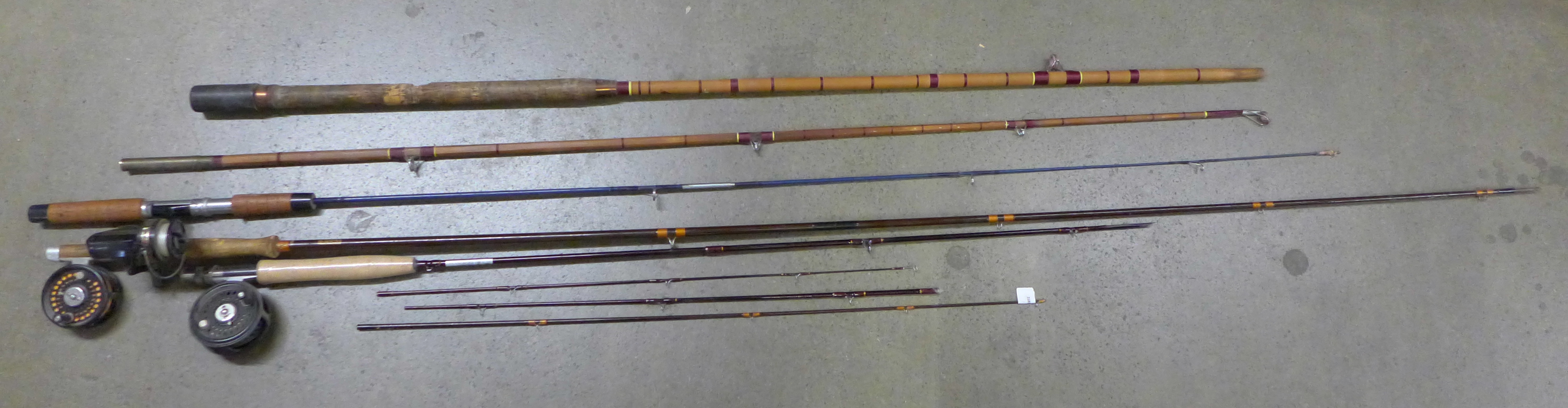 A collection of fishing rods including one Hardy