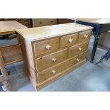 A pine chest of drawers