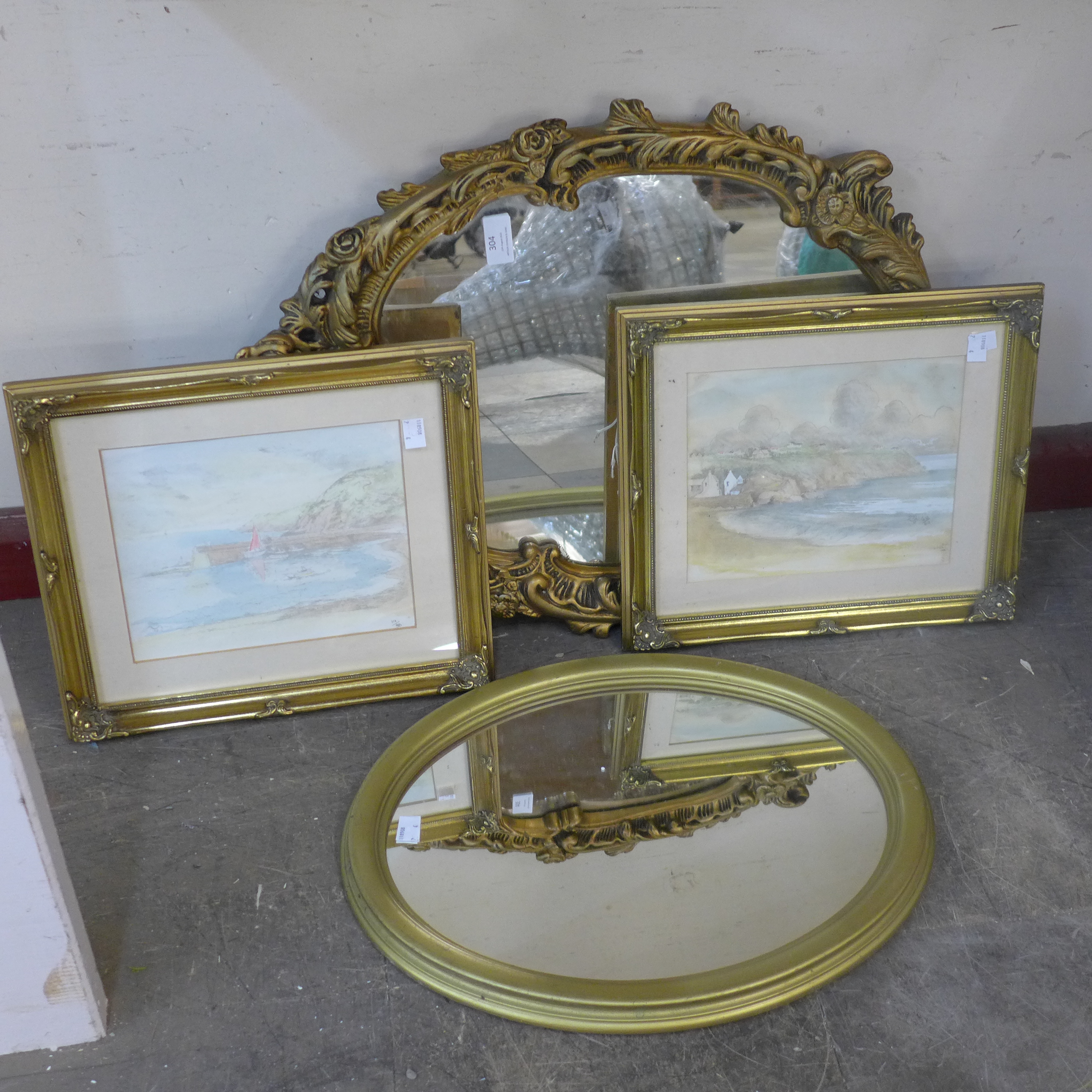 A gilt framed mirror, two prints and one other