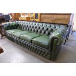 A green leather Chesterfield settee