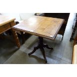 A Victorian oak parquetry topped tea table