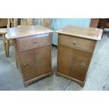 A pair of Stag oak bedside cabinets