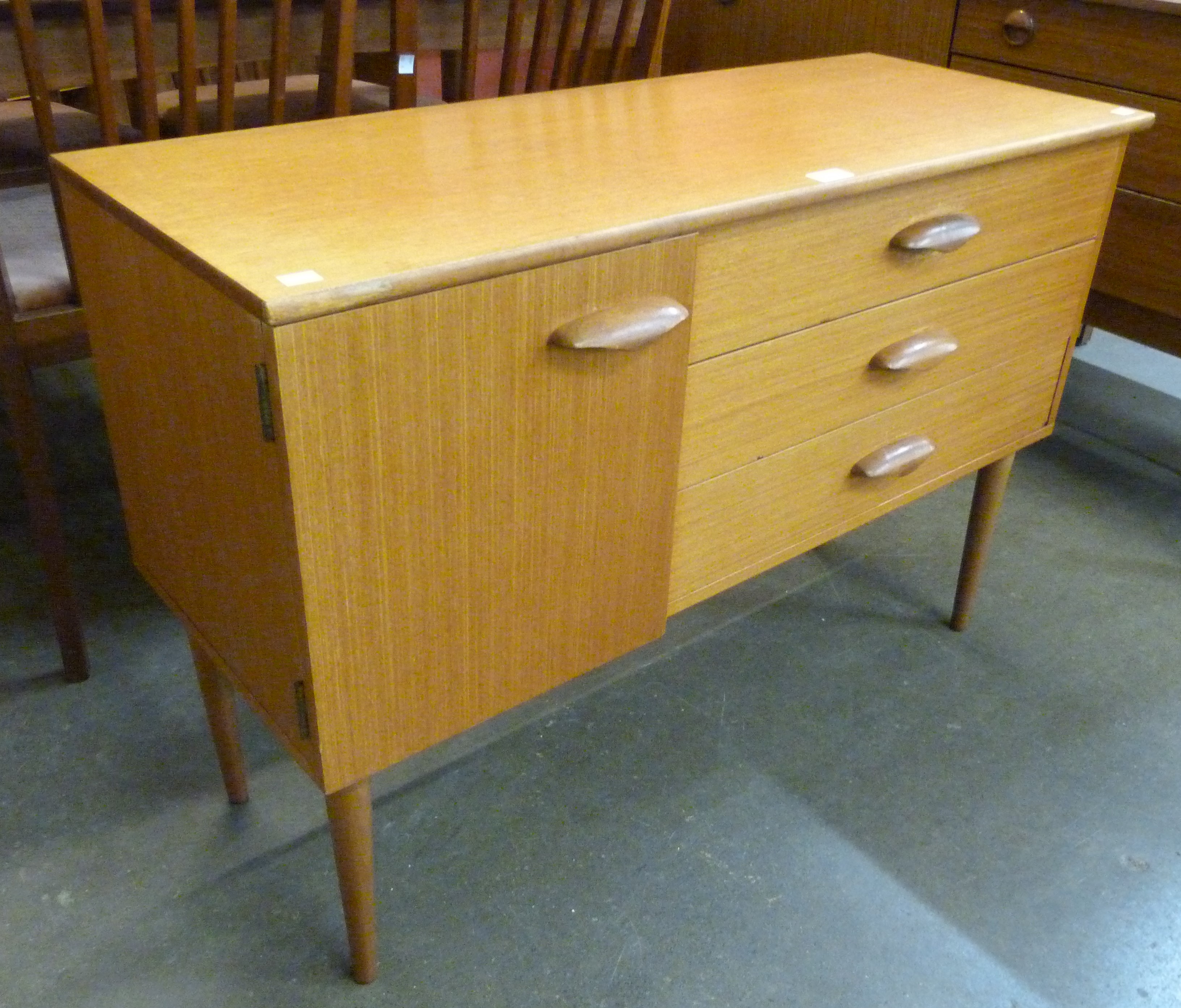 A small teak sideboard