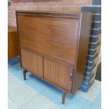 A Beaver & Tapley tola wood cabinet