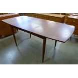 A White & Newton afromosia extending dining table