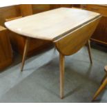 An Ercol elm and beech Windsor drop-leaf table