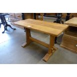 A Cotswold School oak coffee table