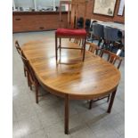 A Swedish Bodafors rosewood extending dining table and six chairs, designed by Bertil Fridhagen.