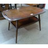An Ercol Golden Dawn elm and beech tray top Windsor coffee table