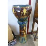 A French majolica fleur de lys jardiniere on stand