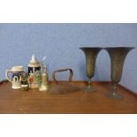 A pair of Islamic brass vases, two small German stoneware steins, etc.