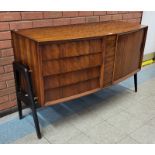 A Danish afromosia bow front sideboard