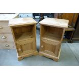 A pair of pine pot cupboards