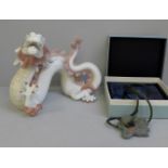 A Lladro dragon and a Lladro Talisman necklace, boxed