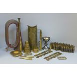 Militaria; a bugle, a brass trench art shell case, a Lancaster Division cigarette case, etc.