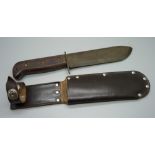 A military issue Bowie knife, J.R. 1979 127/6214 and broad arrow stamped on the blade, with