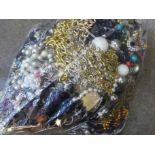 A bag of costume jewellery