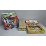 Sealed Yu-Gi-Oh cards:- a sealed Ancient Battles 2021 tin, a sealed Maximum Gold El Dorado 2020, a