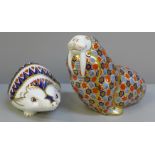 Royal Crown Derby hedgehog and walrus paperweights, walrus with gold stopper, both boxed