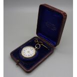 A 935 silver fob watch in a fitted case, with key