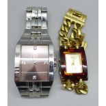 A lady's and a gentleman's Guess wristwatch, (2)