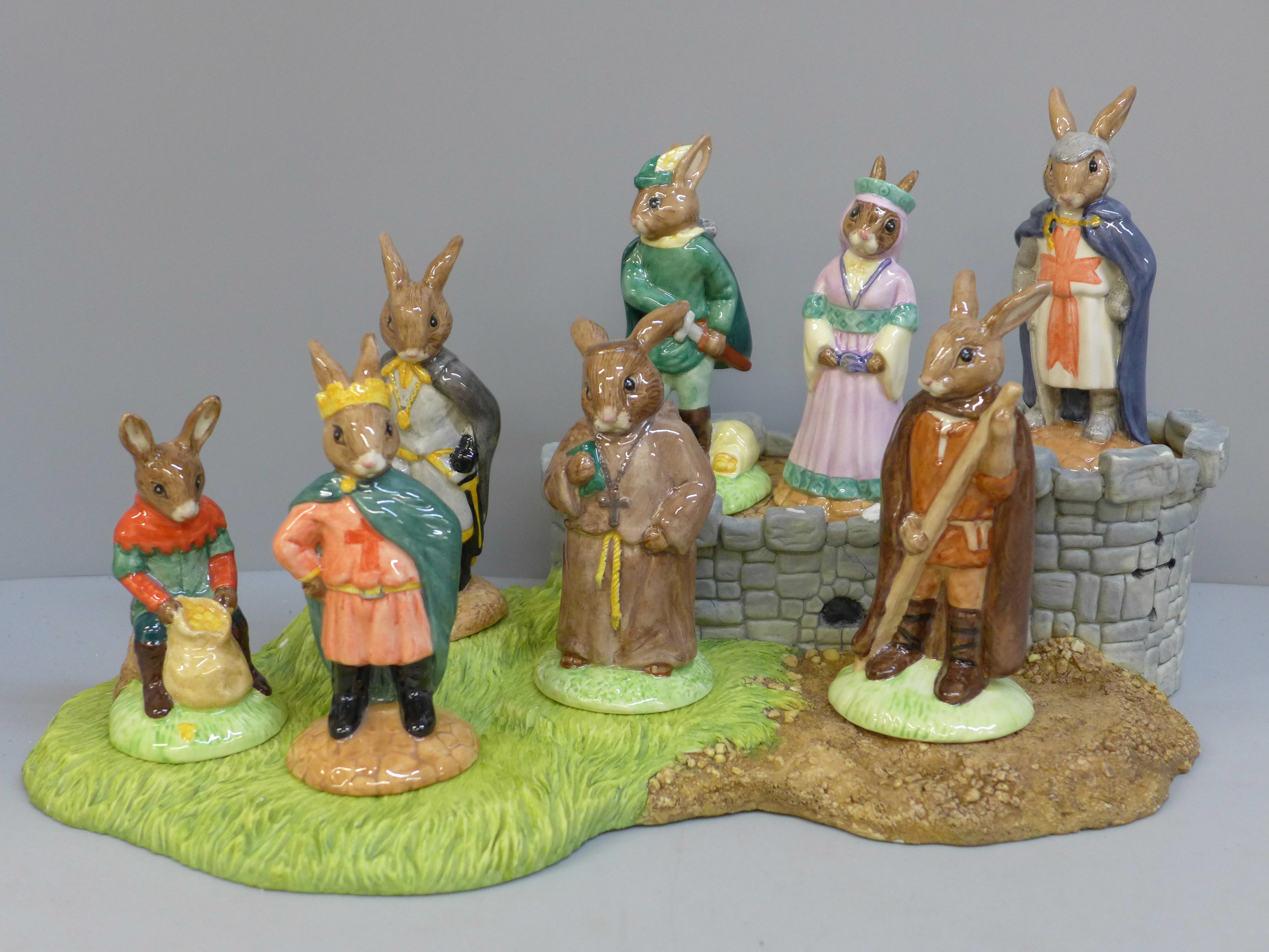 A Royal Doulton Bunnykins Robin Hood collection and base, all boxed