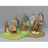 A Royal Doulton Bunnykins Robin Hood collection and base, all boxed